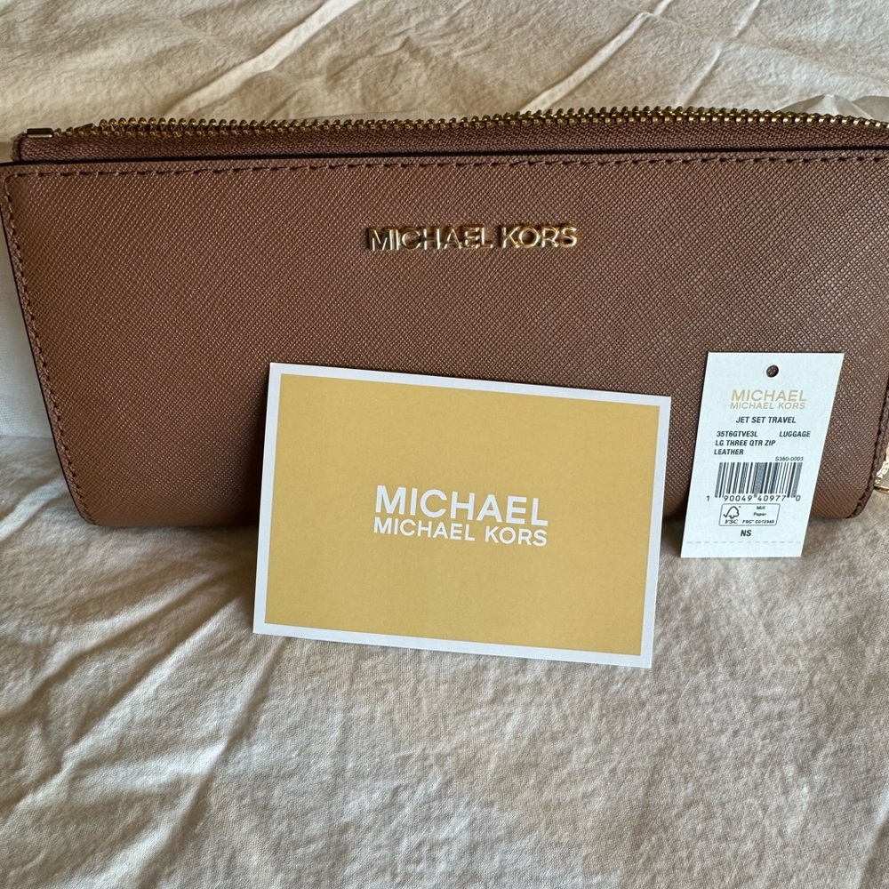 Jet Set Travel Large Saffiano
Leather Quarter-Zip Wallet